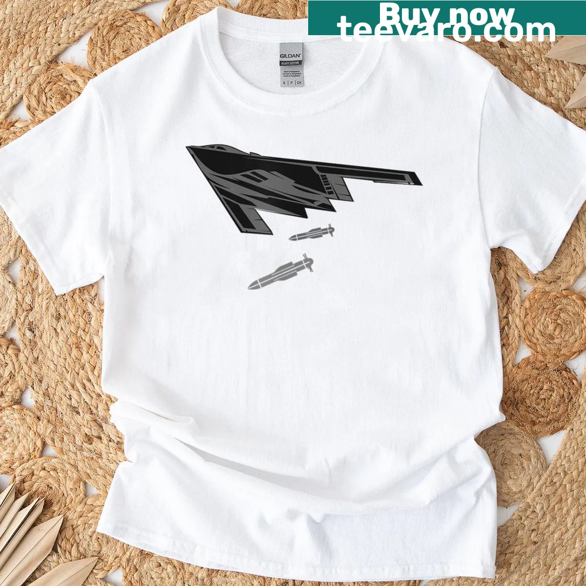 Realistic B-2 Stealth Bomber graphic t-shirt — on a men's t-shirt