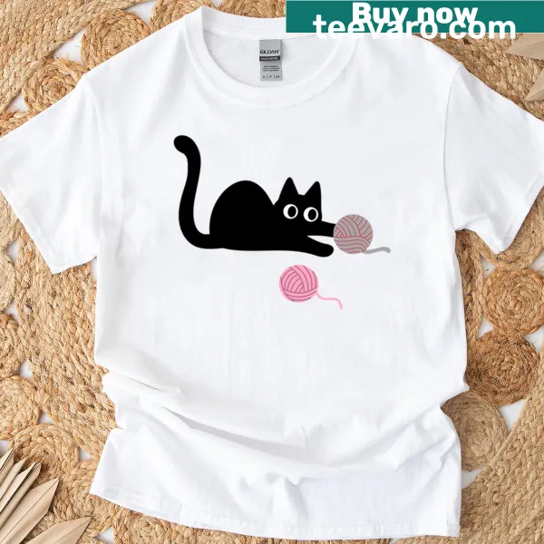 Playful black cat with yarn balls t-shirt design