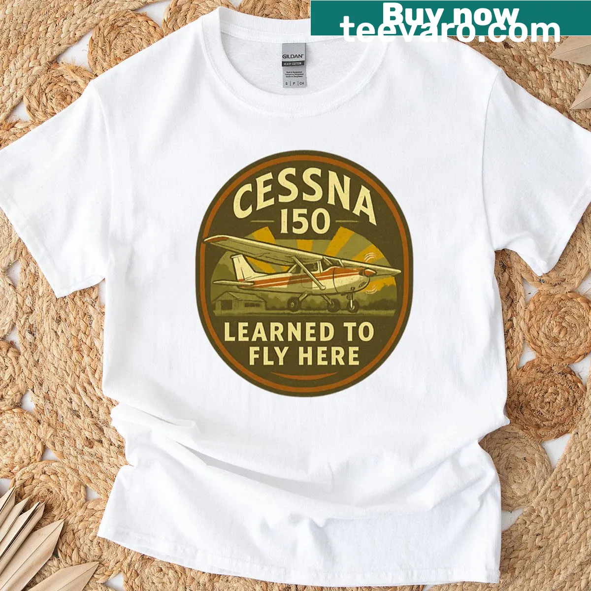 Vintage-style Cessna 150 trainer airplane graphic T-shirt — on a men's t-shirt