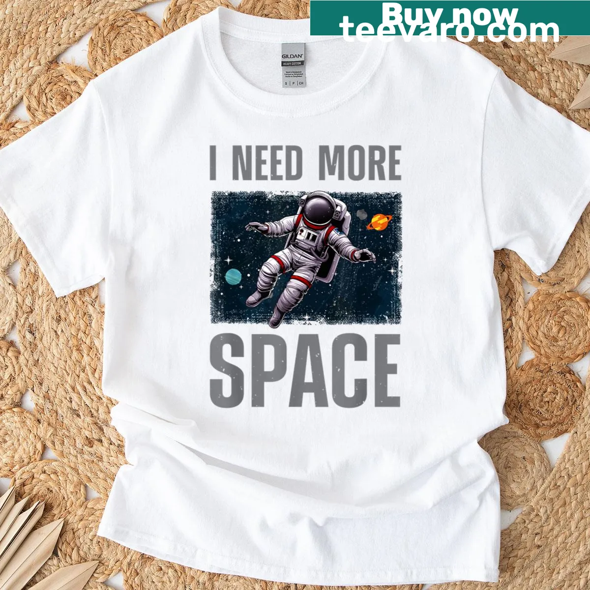 Cartoon astronaut surrounded by space elements on a T-shirt — on a men's t-shirt
