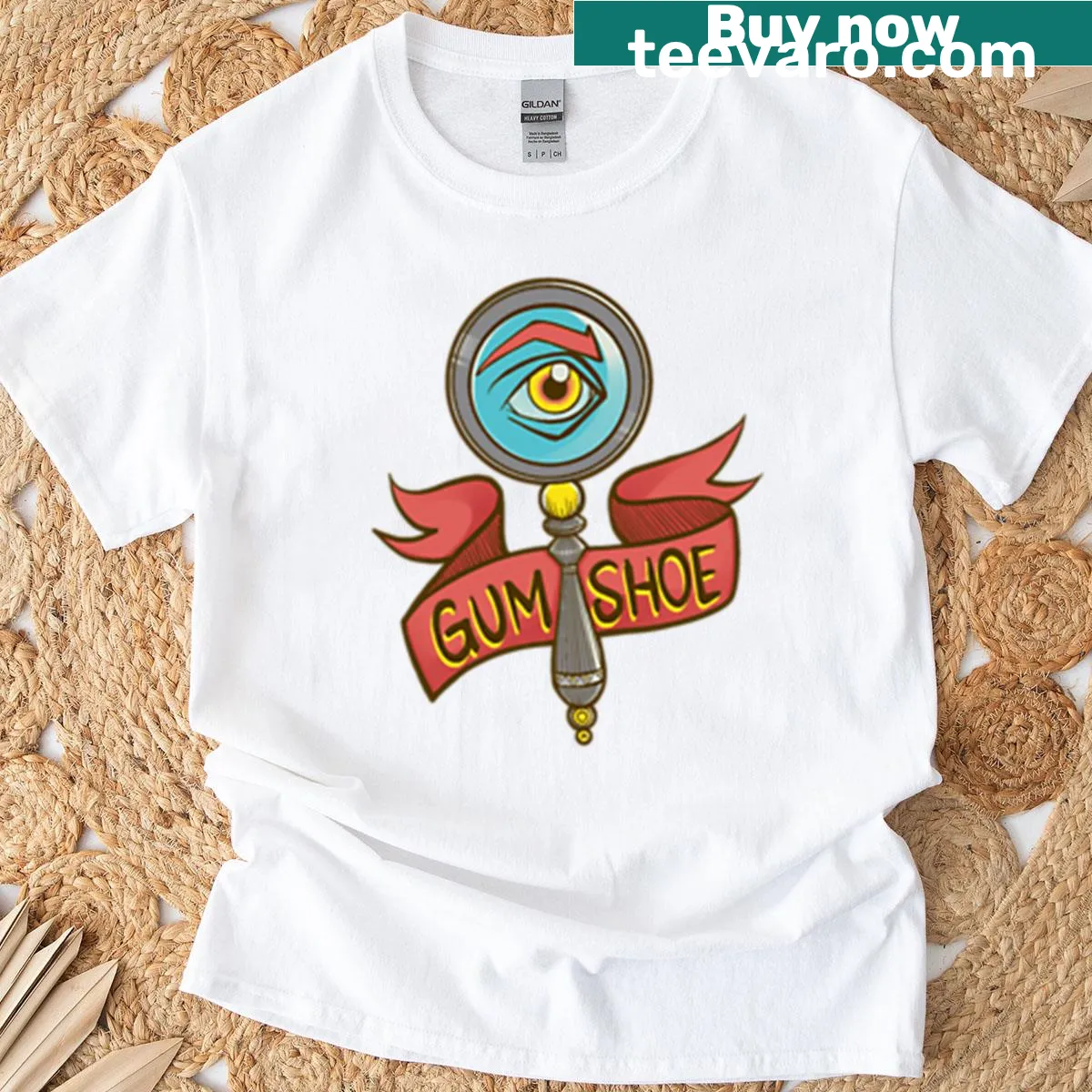 T-shirt featuring a humorous 'Gumshoe Of The Year' graphic design — on a men's t-shirt