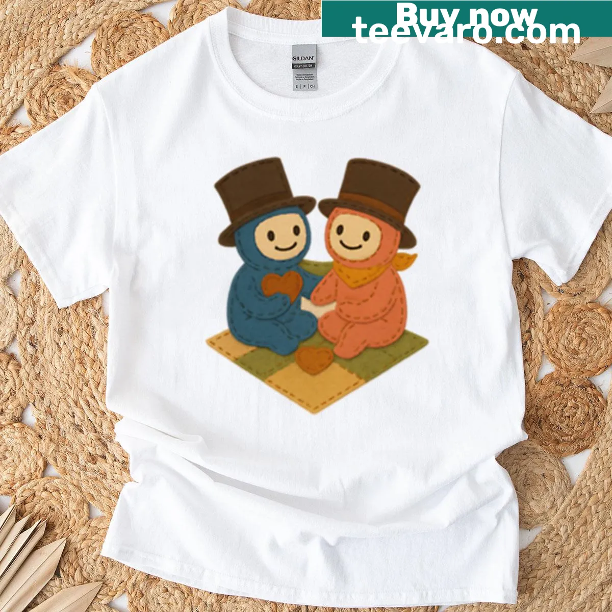 Cozy couple t-shirt with felt heart patches under a quilt — on a men's t-shirt