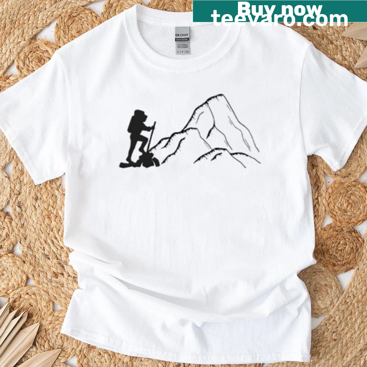 Hiking t-shirt featuring a scenic mountain landscape illustration — on a men's t-shirt