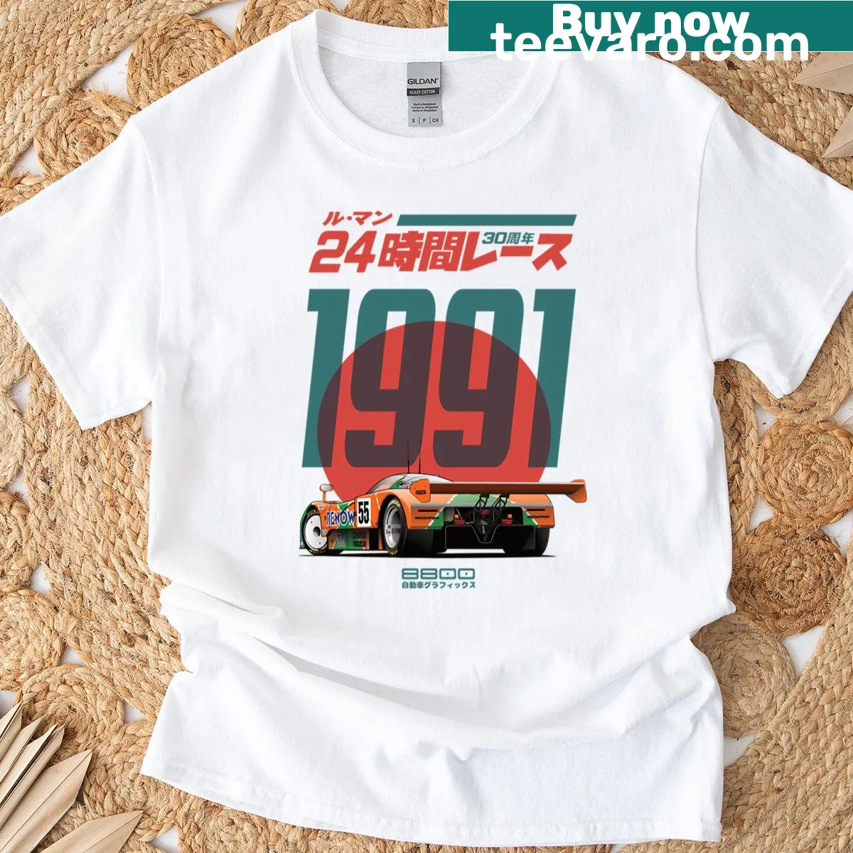 Mazda 787B Le Mans T-shirt featuring a detailed illustration of the race car. — on a men's t-shirt