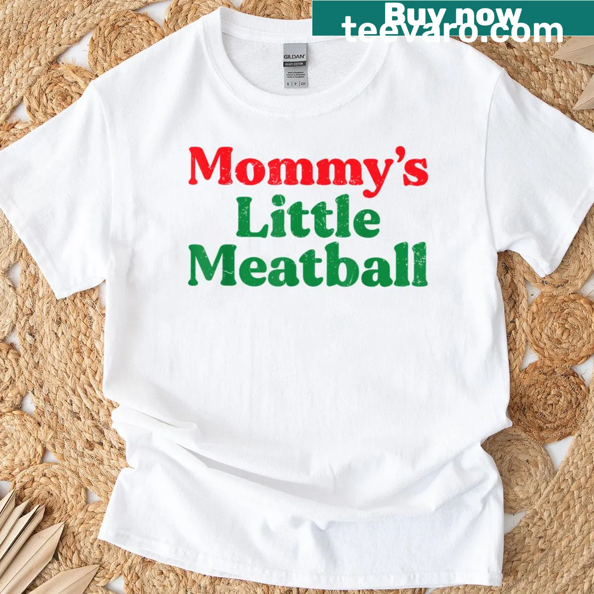 T-shirt featuring the phrase 'Mommy's Little Meatball' with playful illustration — on a men's t-shirt