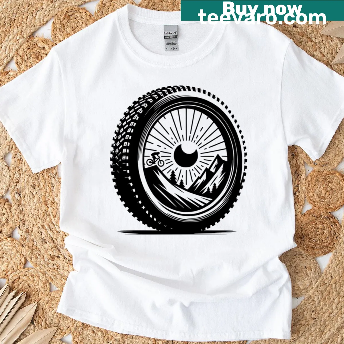 Artistic t-shirt featuring a mountain bike wheel in a sunburst design — on a men's t-shirt