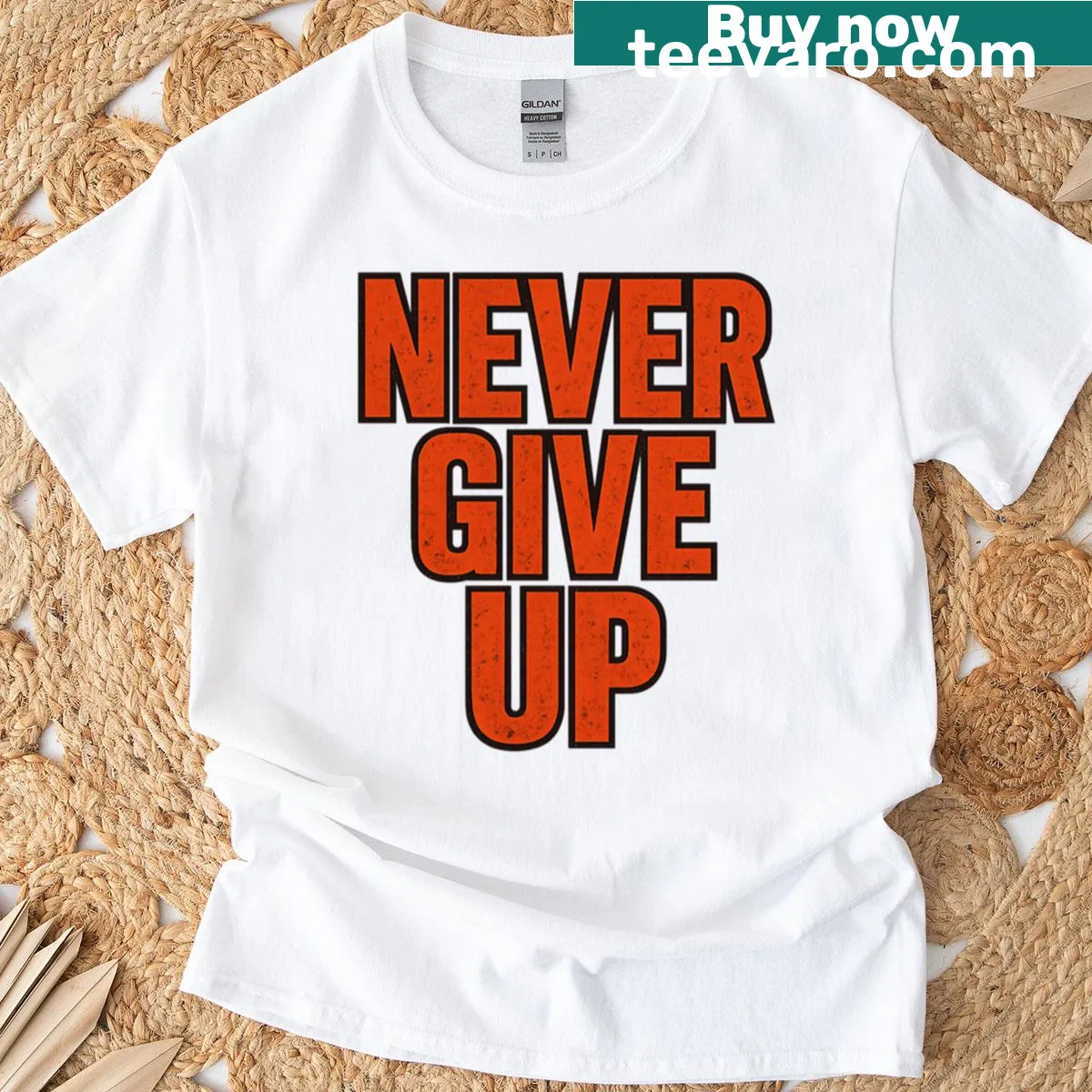 Bold motivational graphic on Never Give Up t-shirt encouraging resilience. — on a men's t-shirt