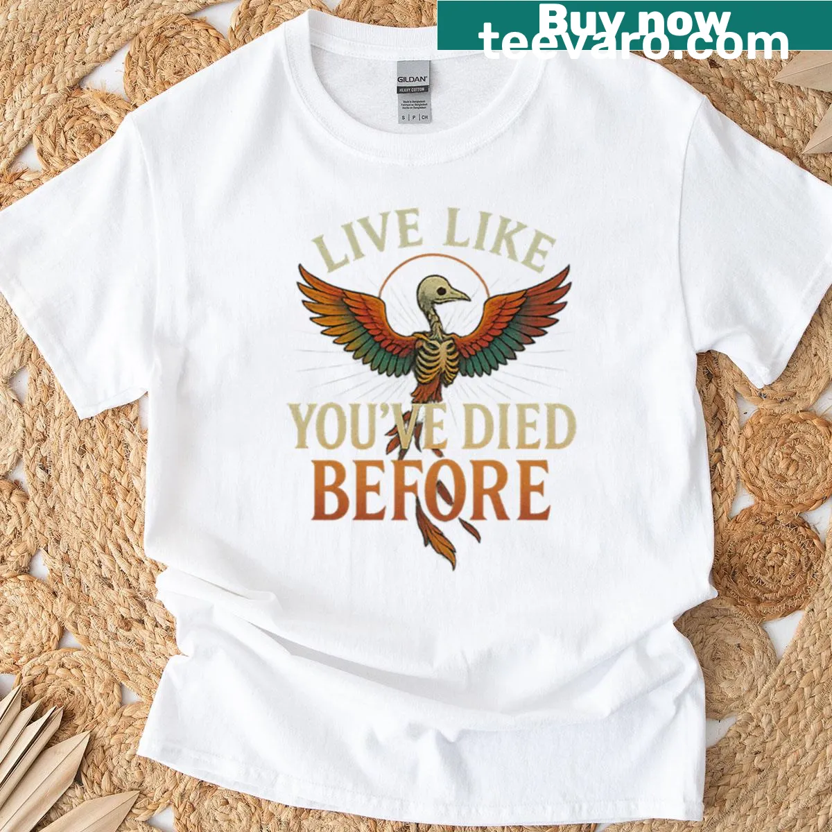 Inspirational T-shirt with text: Reborn With Fire In Your Bones — on a men's t-shirt