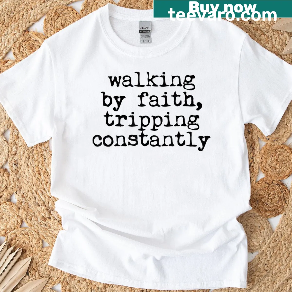 Inspirational Christian T-shirt with the phrase 'Walking By Faith Tripping Constantly' — on a men's t-shirt