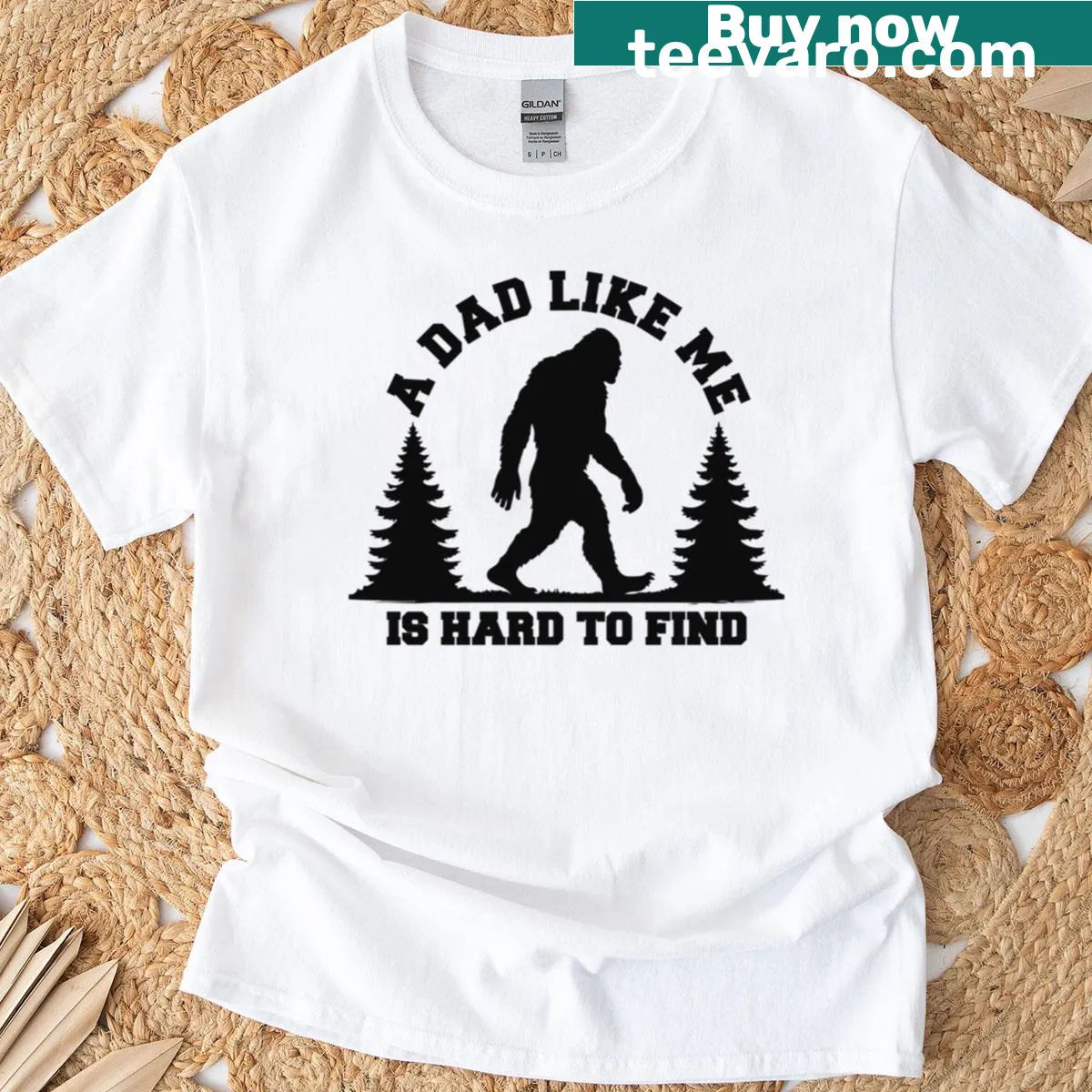 Illustrated Bigfoot with text about finding a unique dad — on a men's t-shirt