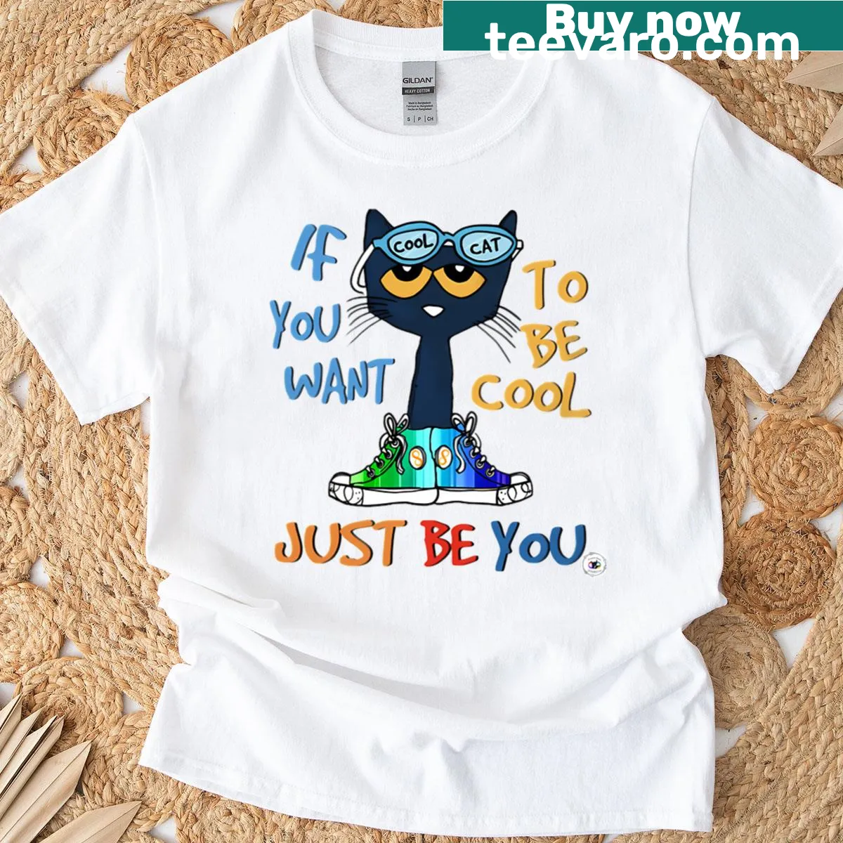 Cartoon vintage logo with books, shoes, and a cat on a t-shirt — on a men's t-shirt