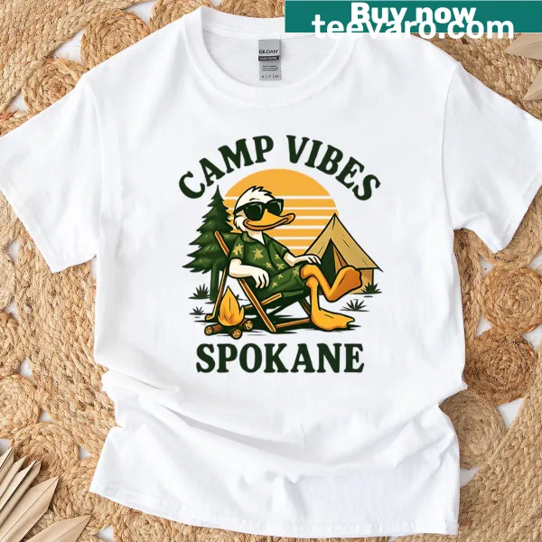 Illustrated design of camping elements on a T-shirt.