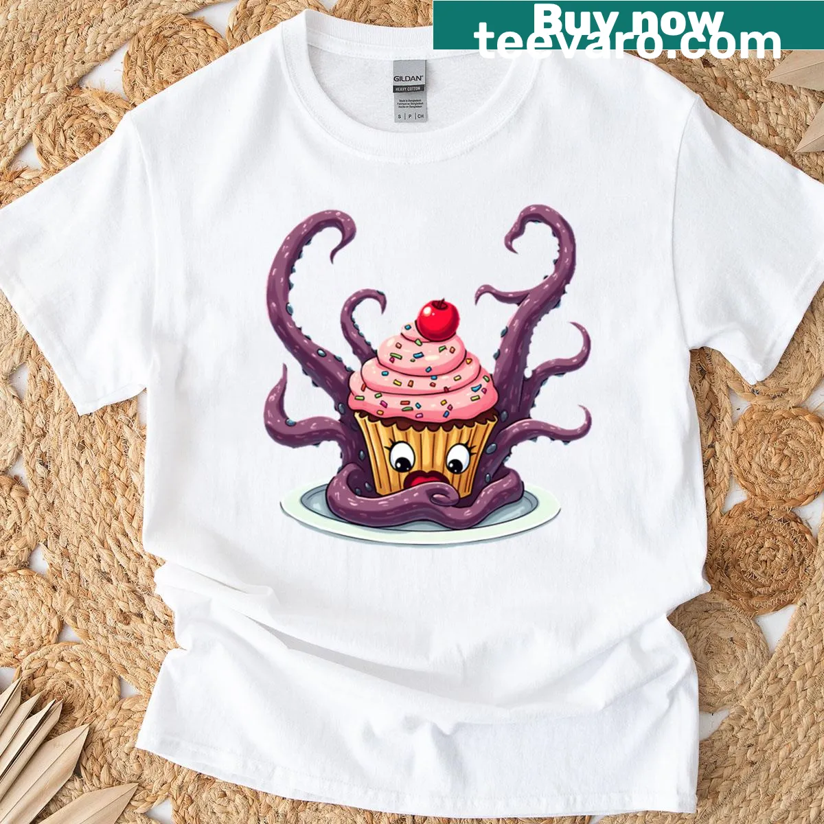 Cartoon graphic of cupcake attacking a kraken on a T-shirt — on a men's t-shirt