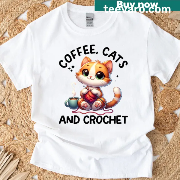 Oversized t-shirt featuring a cat, coffee, and crochet illustrations