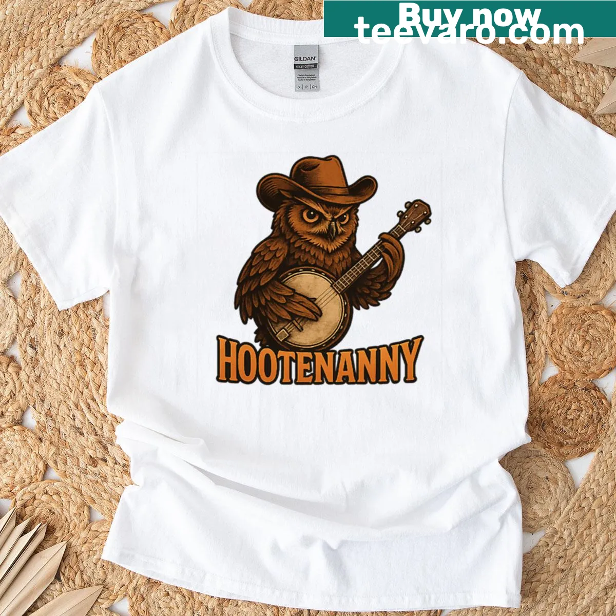 Owl cowboy banjo player graphic T-shirt — on a men's t-shirt