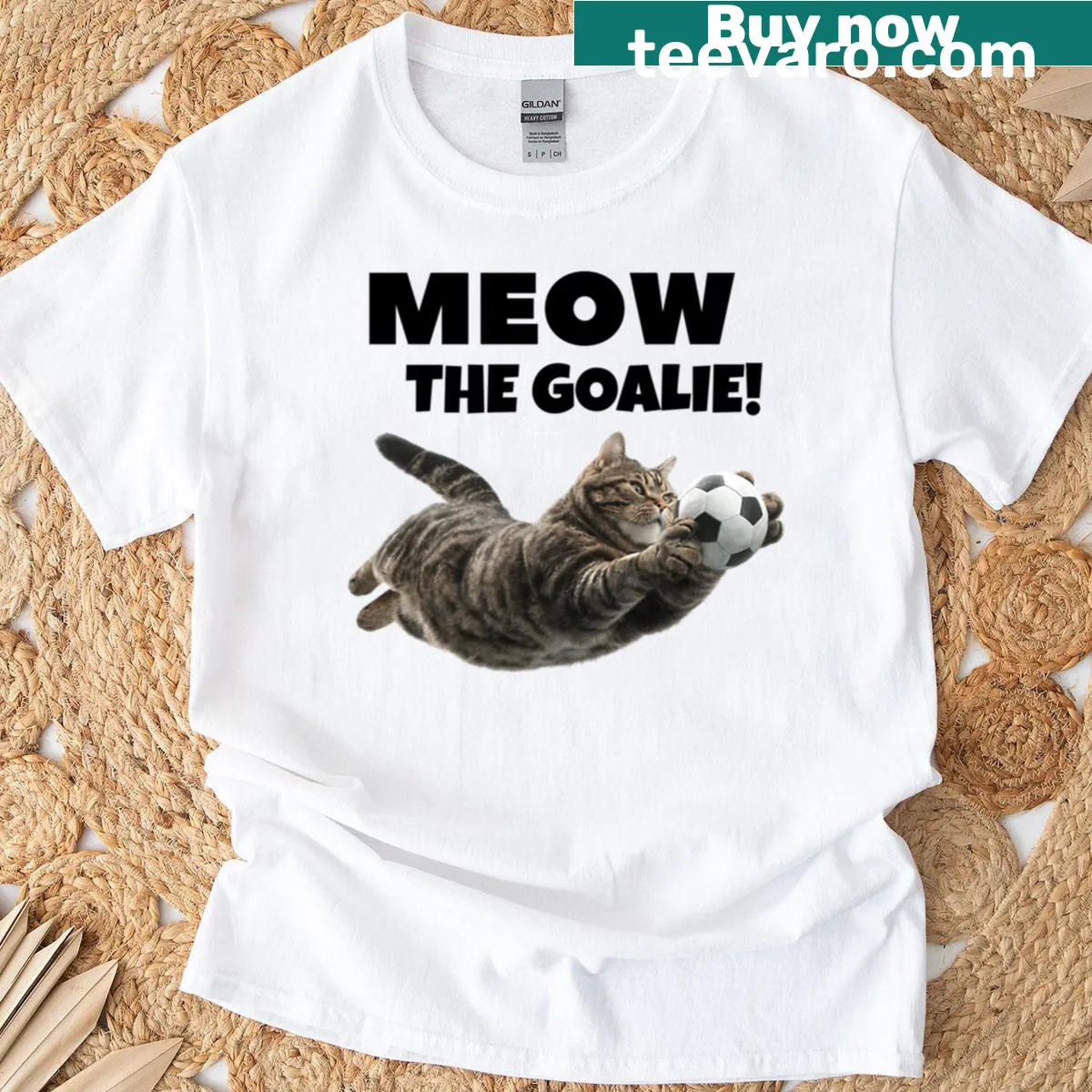 Funny cat-themed soccer t-shirt with the pun 'Meow The Goalie' — on a men's t-shirt