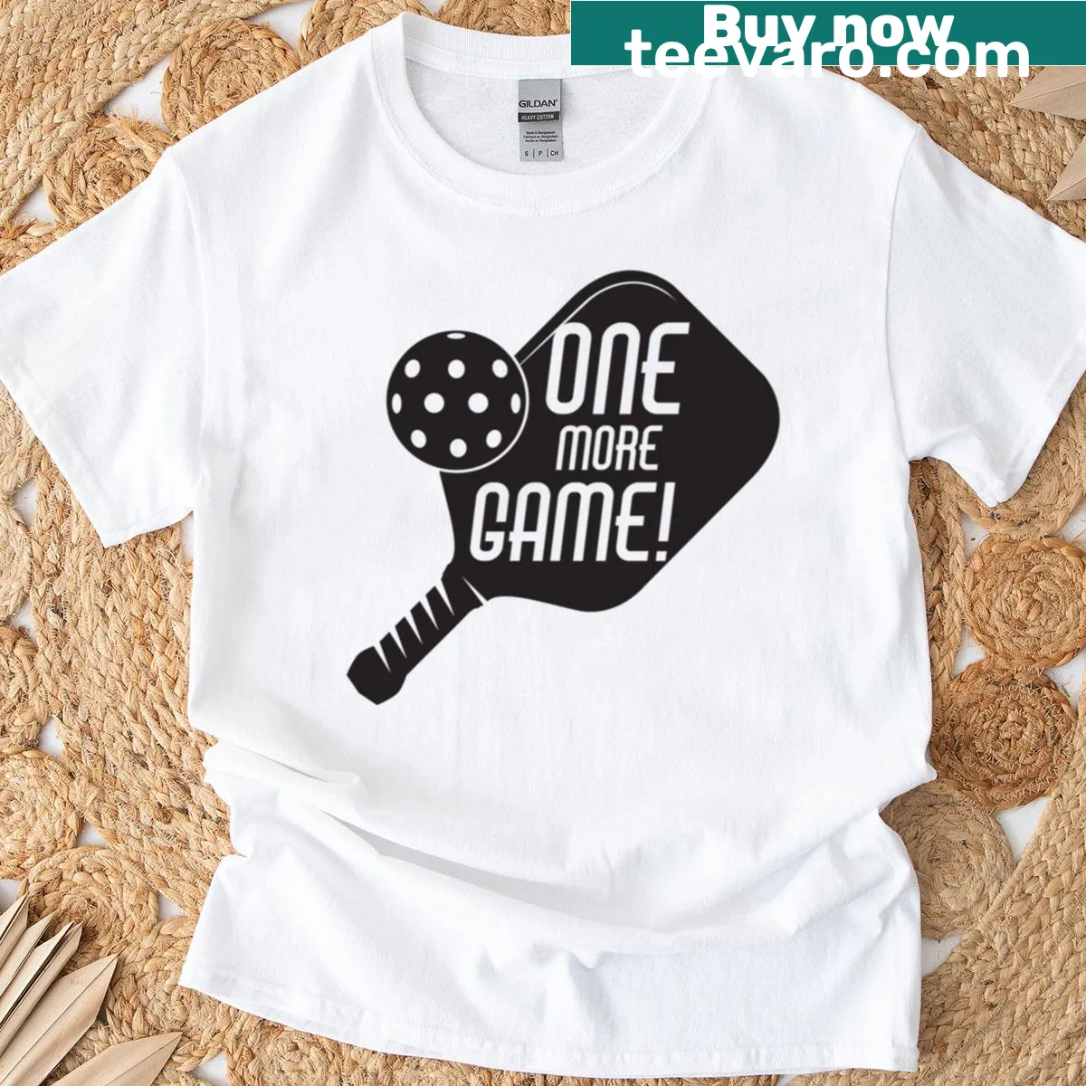 Playful typography design saying 'One More Game' on a T-shirt — on a men's t-shirt