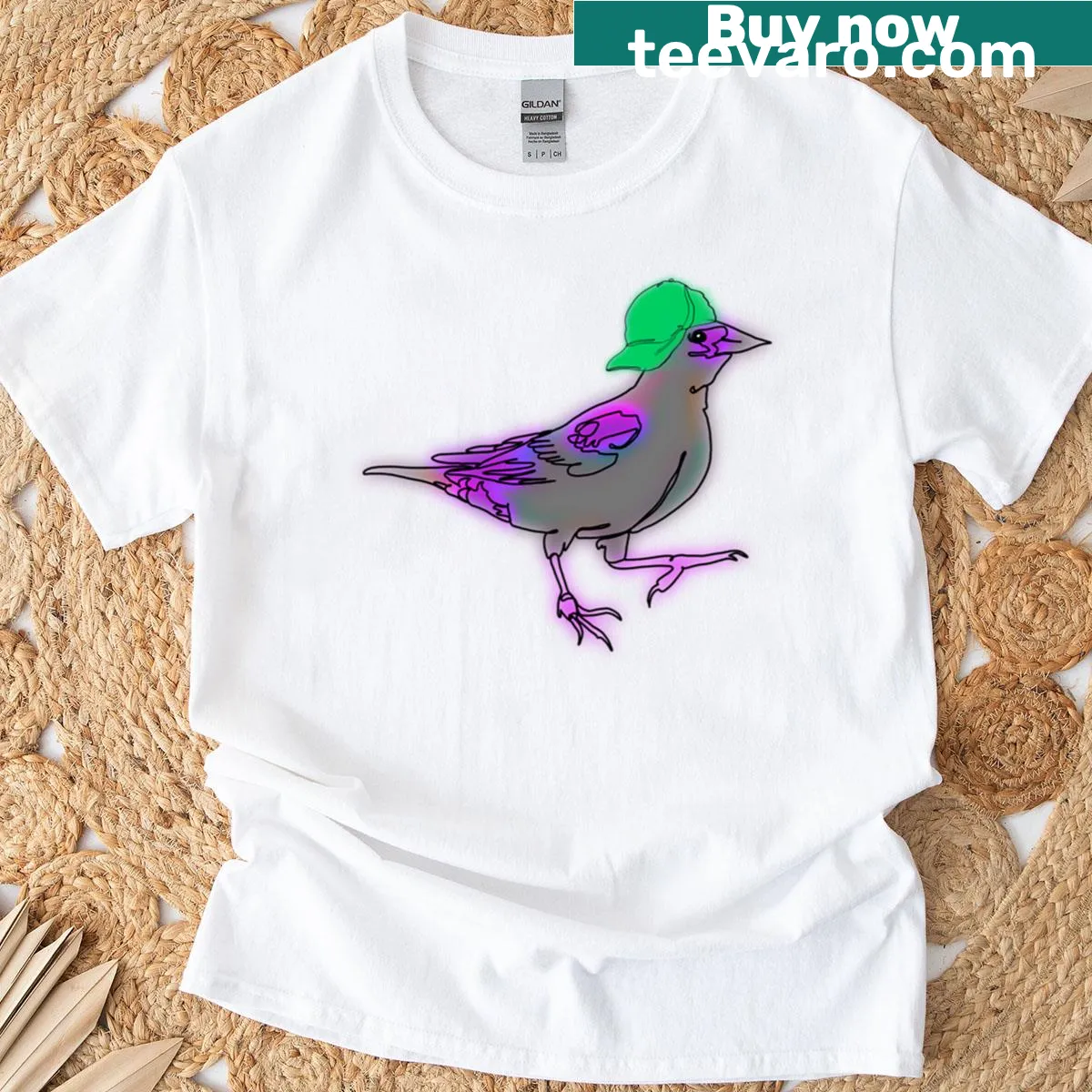 Oversized T-shirt with cute purple blackbird line drawing in a green hat — on a men's t-shirt