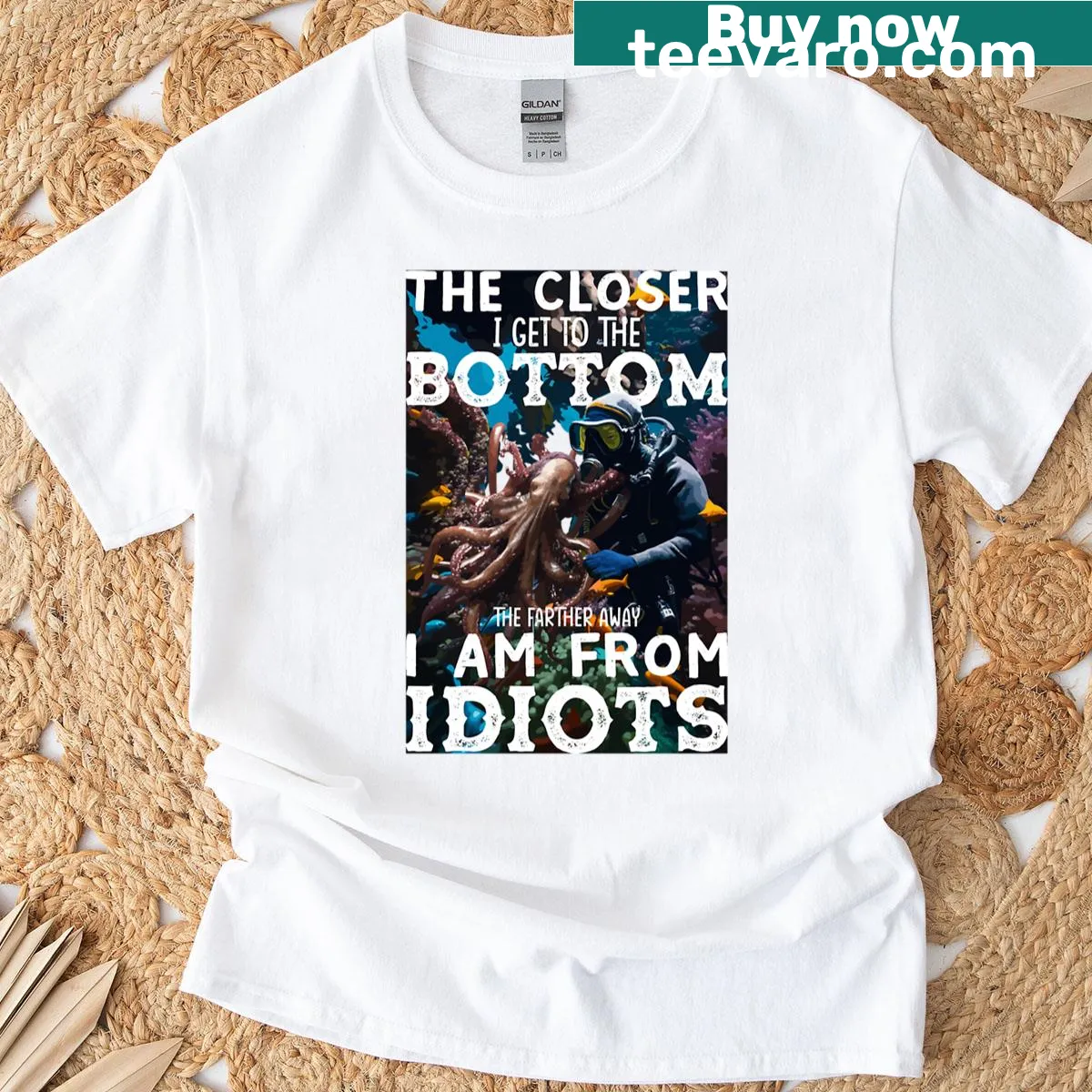 T-shirt featuring a scuba diving illustration — on a men's t-shirt