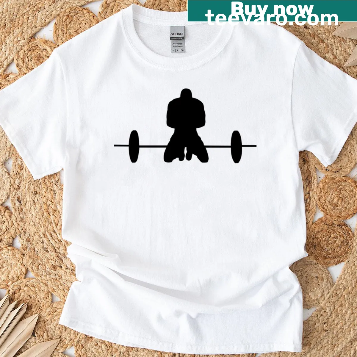T-shirt featuring a graphic of a weightlifting barbell — on a men's t-shirt