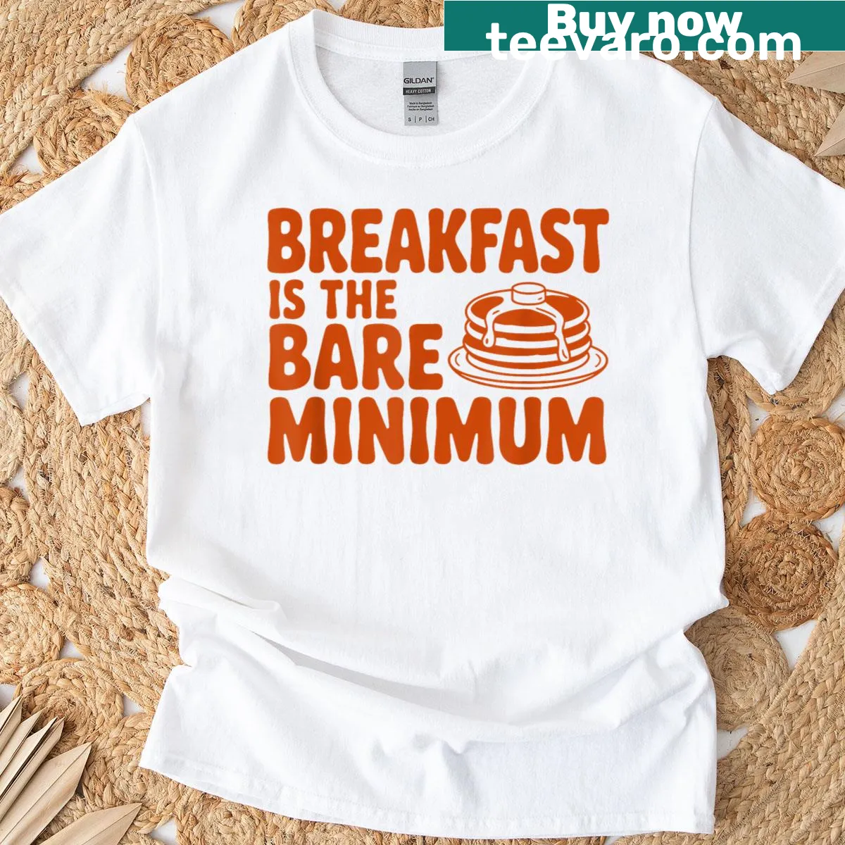 Playful t-shirt with text about breakfast importance — on a men's t-shirt