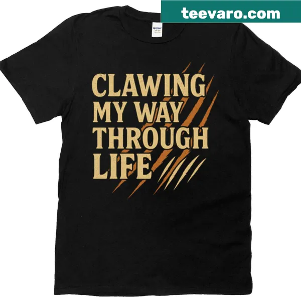 Vintage typography design featuring a cat with the phrase 'Clawing My Way Through Life'
