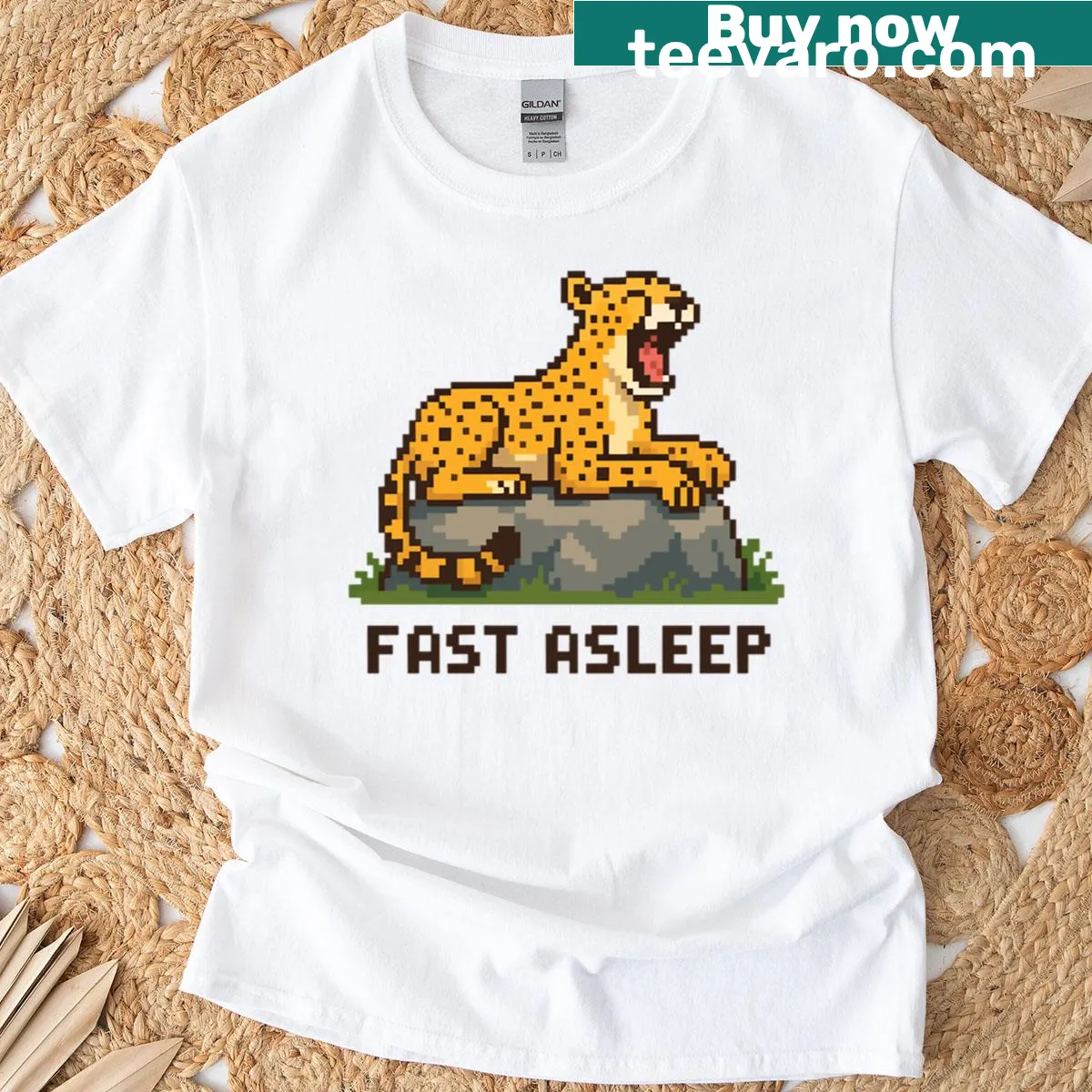 Pixel art t-shirt of a yawning cheetah in a rock scene — on a men's t-shirt