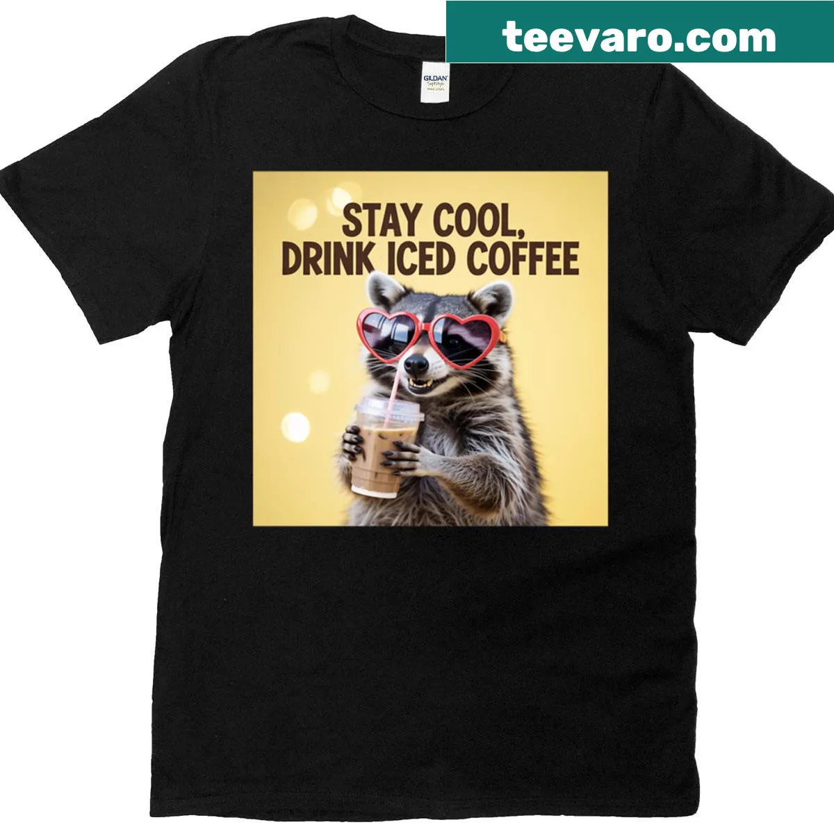 Playful raccoon enjoying iced coffee graphic on an oversized t-shirt — on a men's t-shirt