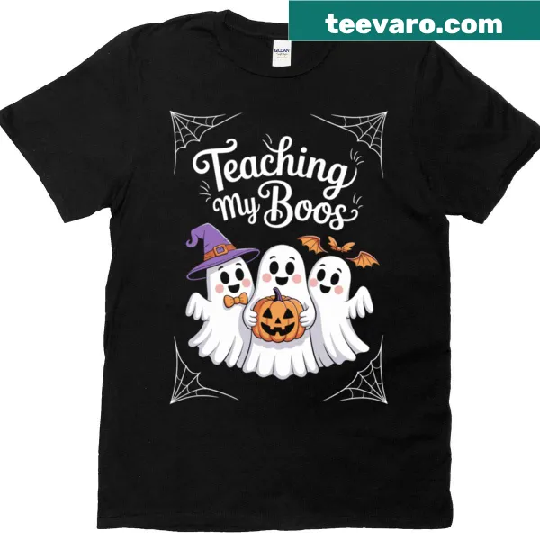 Playful text 'Teaching My Boos' on a teacher t-shirt