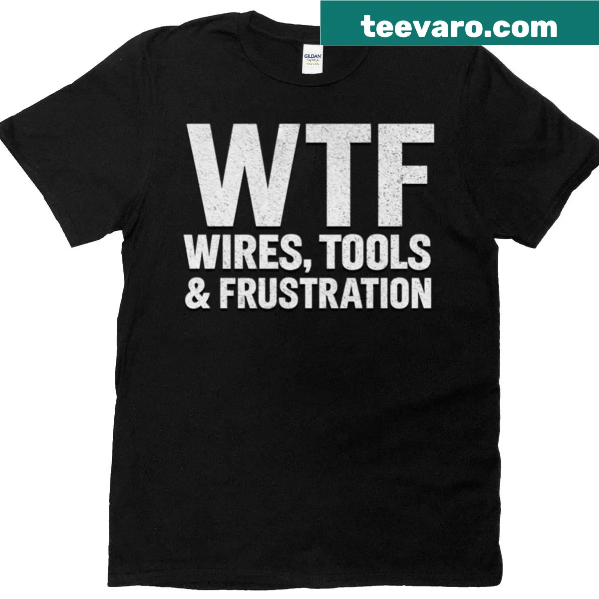 Oversized t-shirt with the phrase Wtf Wires Tools in bold typography — on a men's t-shirt