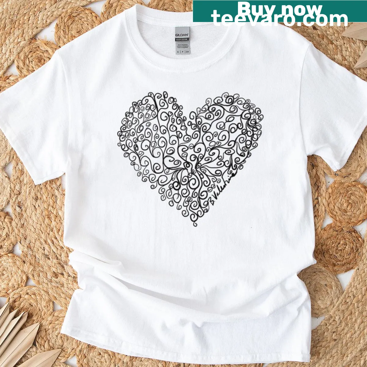 Hand-drawn ornate coiled heart design on a T-shirt — on a men's t-shirt