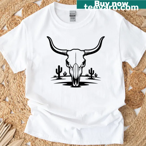 T-shirt featuring a cattle skull design in a desert scene