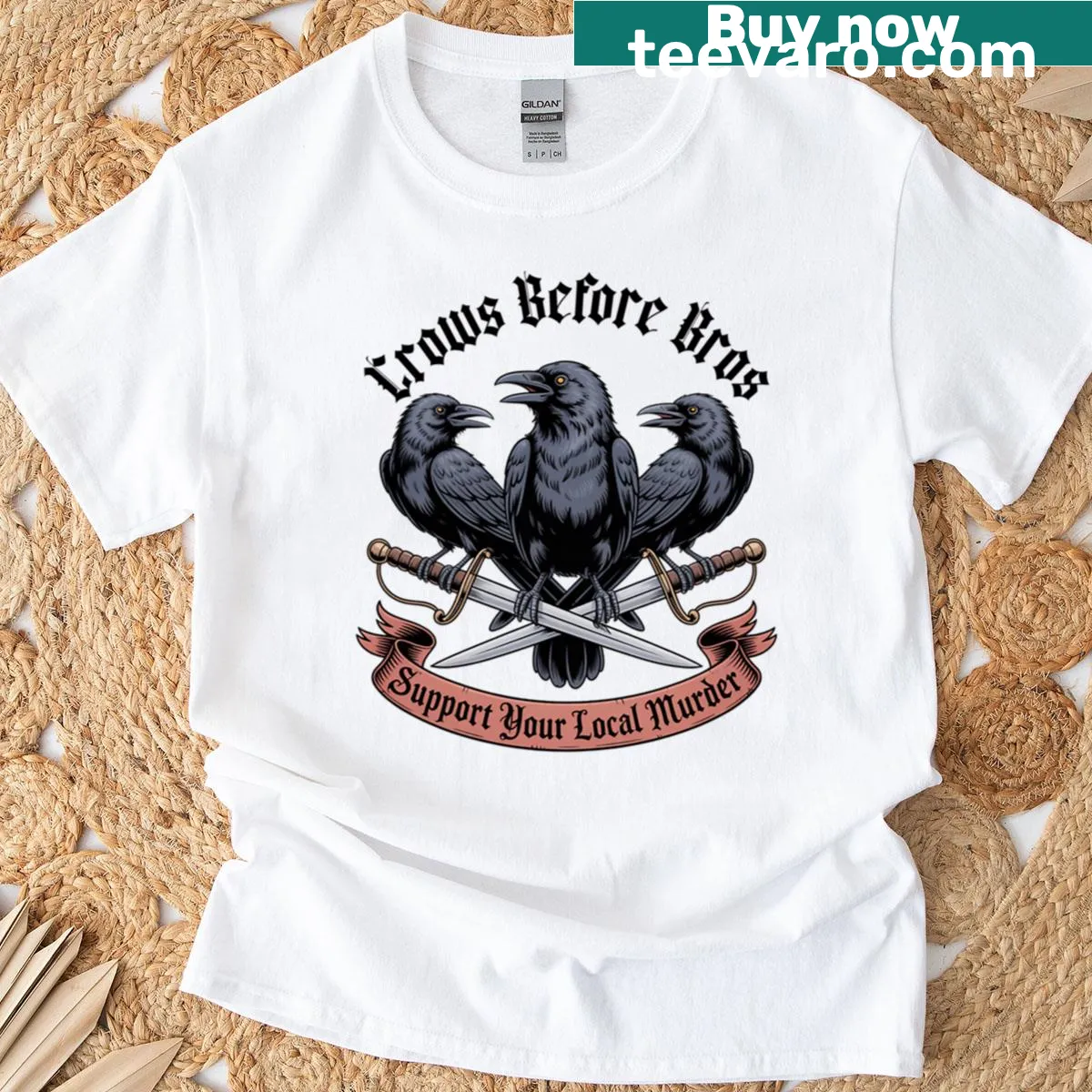 Gothic crow and sword crest design on a casual t-shirt — on a men's t-shirt