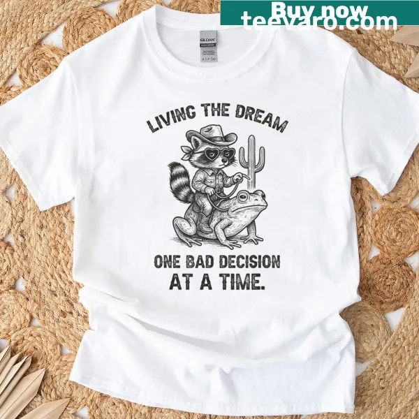 Funny t-shirt with a raccoon cowboy illustration and witty text