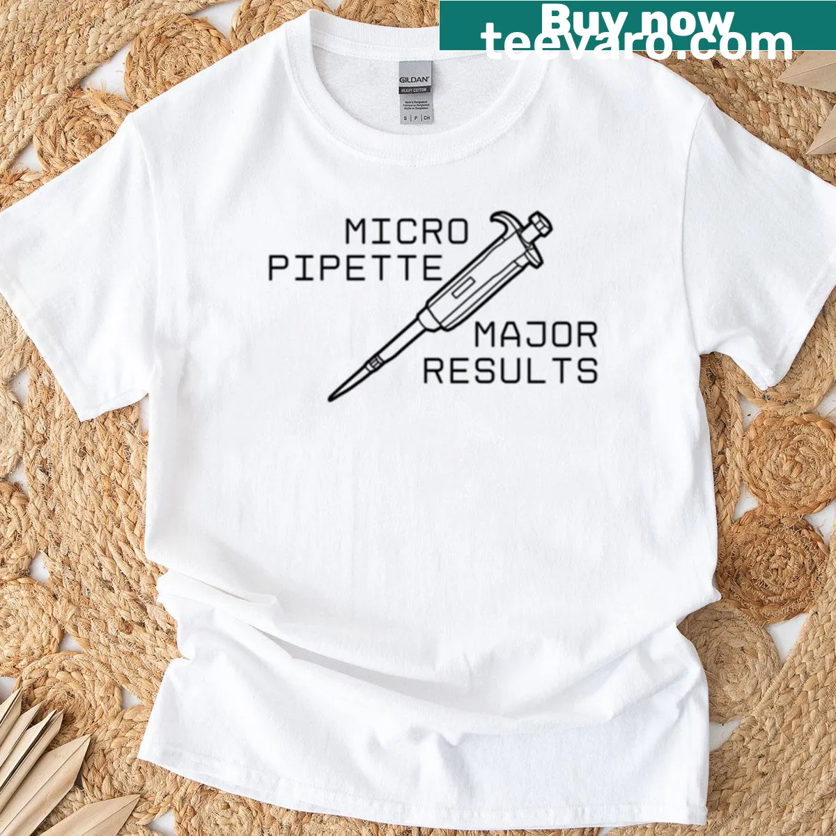 Minimalistic black text t-shirt featuring micropipette design — on a men's t-shirt