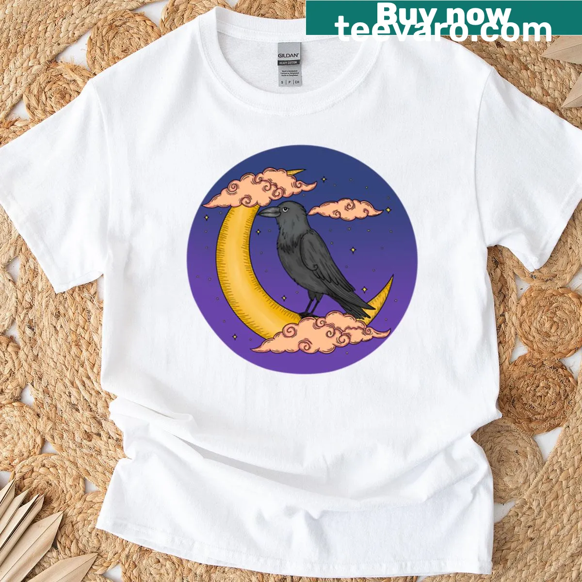 T-shirt featuring an illustrated crow at night — on a men's t-shirt