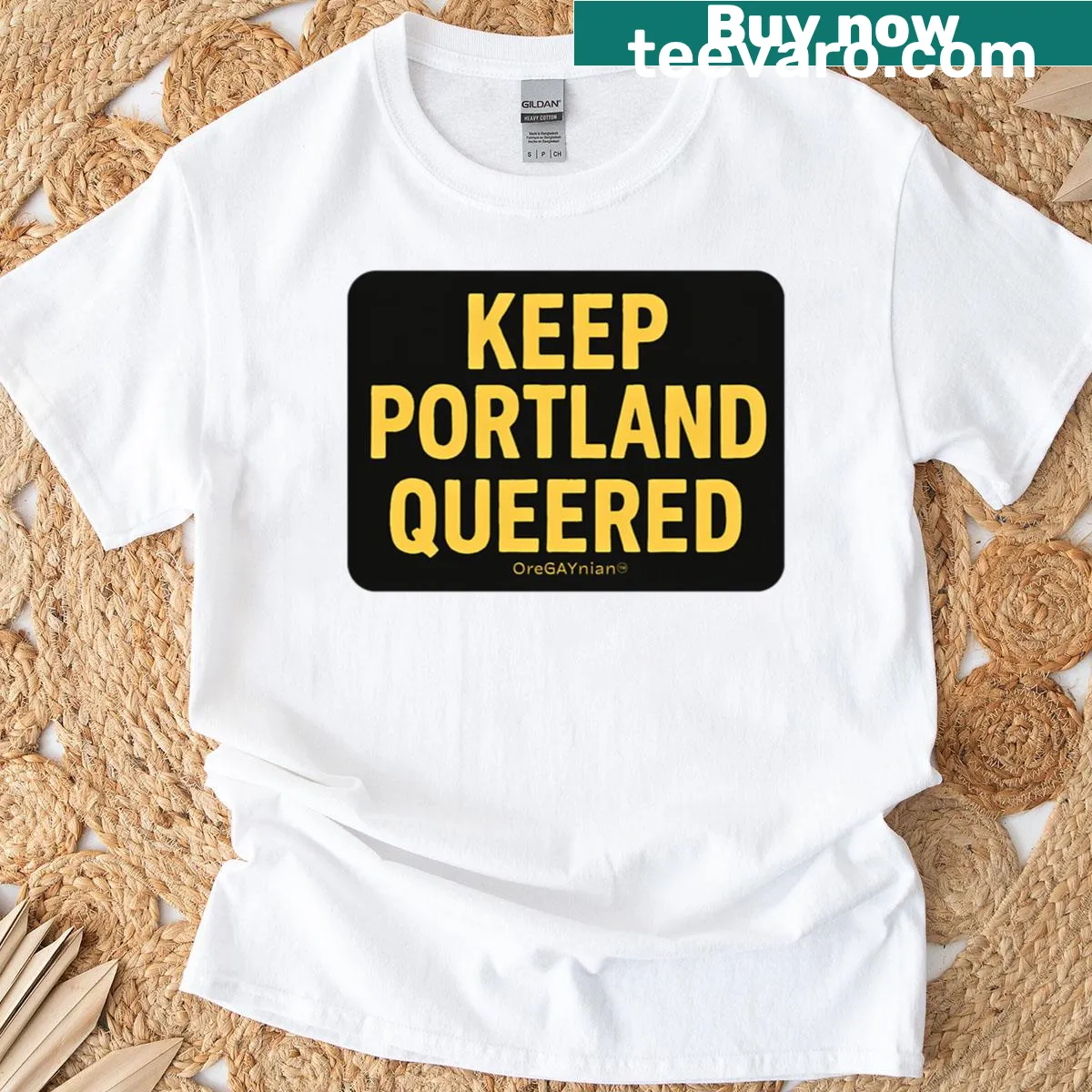 Bold typography T-shirt with Keep Portland Queered design — on a men's t-shirt