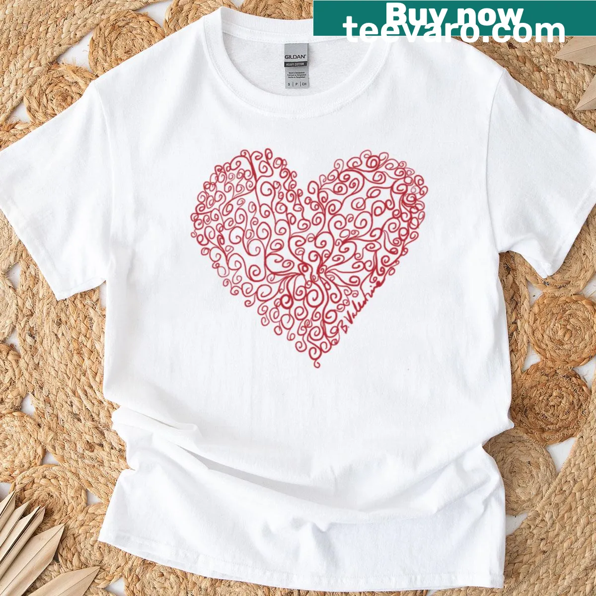 Hand-drawn ornate heart graphic on a t-shirt — on a men's t-shirt