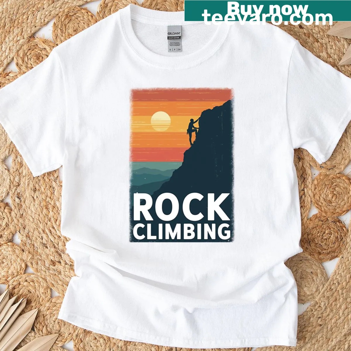 Vintage graphic of rock climbing at sunset, celebrating adventure. — on a men's t-shirt