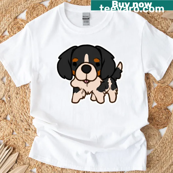 Cartoon tri-color Cavalier King Charles dog graphic on T-shirt