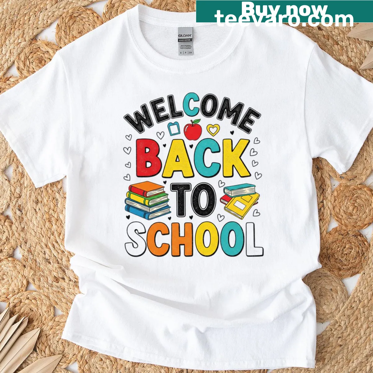 Oversized t-shirt featuring colorful lettering 'Welcome Back To School' and a book graphic — on a men's t-shirt