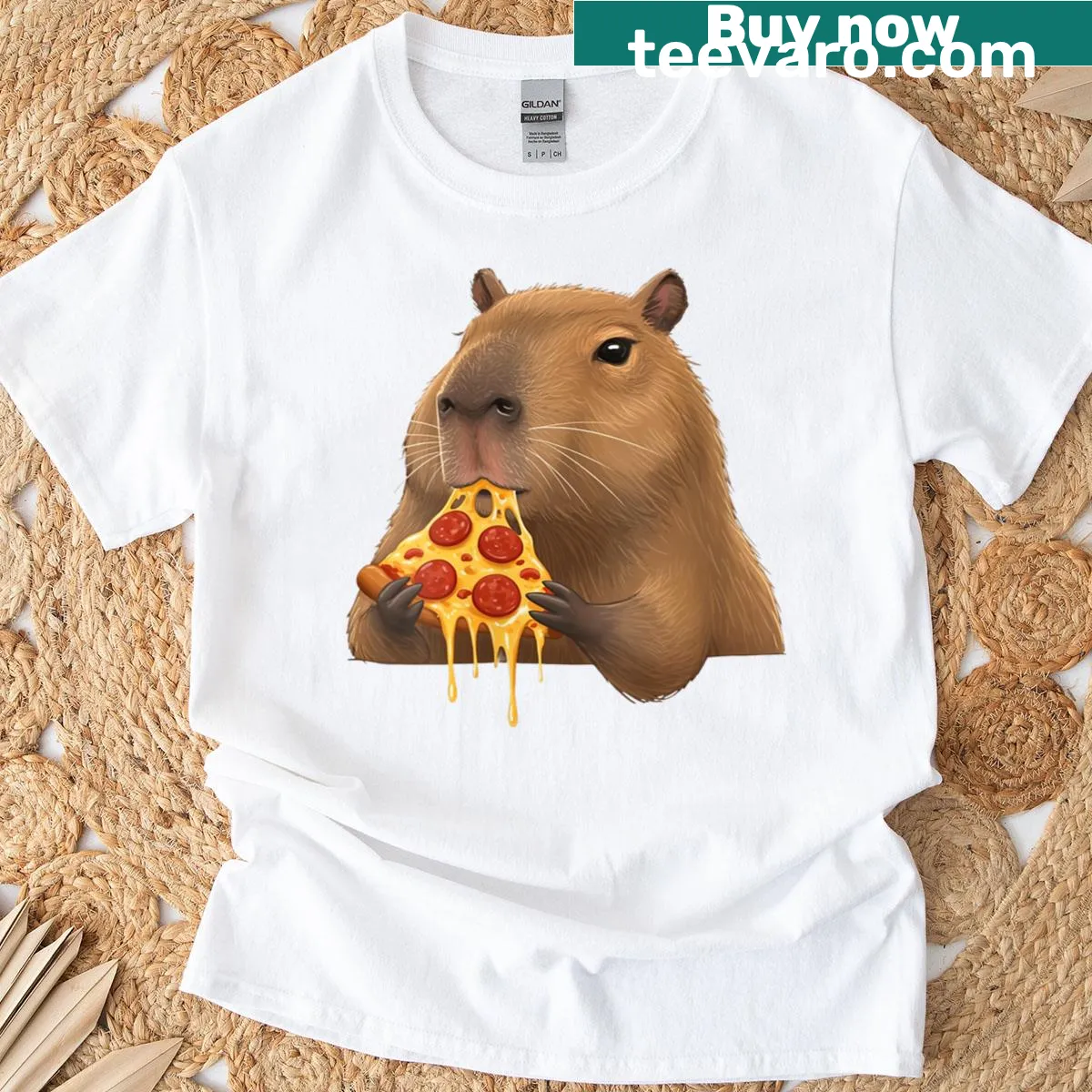 Kawaii capybara eating pizza graphic on T-shirt — on a men's t-shirt