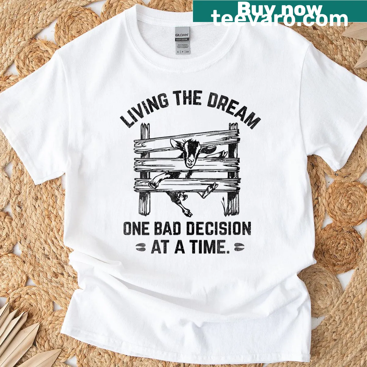 Funny T-shirt featuring a goat living the dream with amusing text — on a men's t-shirt