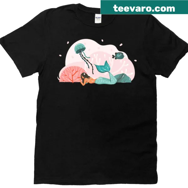 Whimsical pastel mermaid graphic on oversized T-shirt