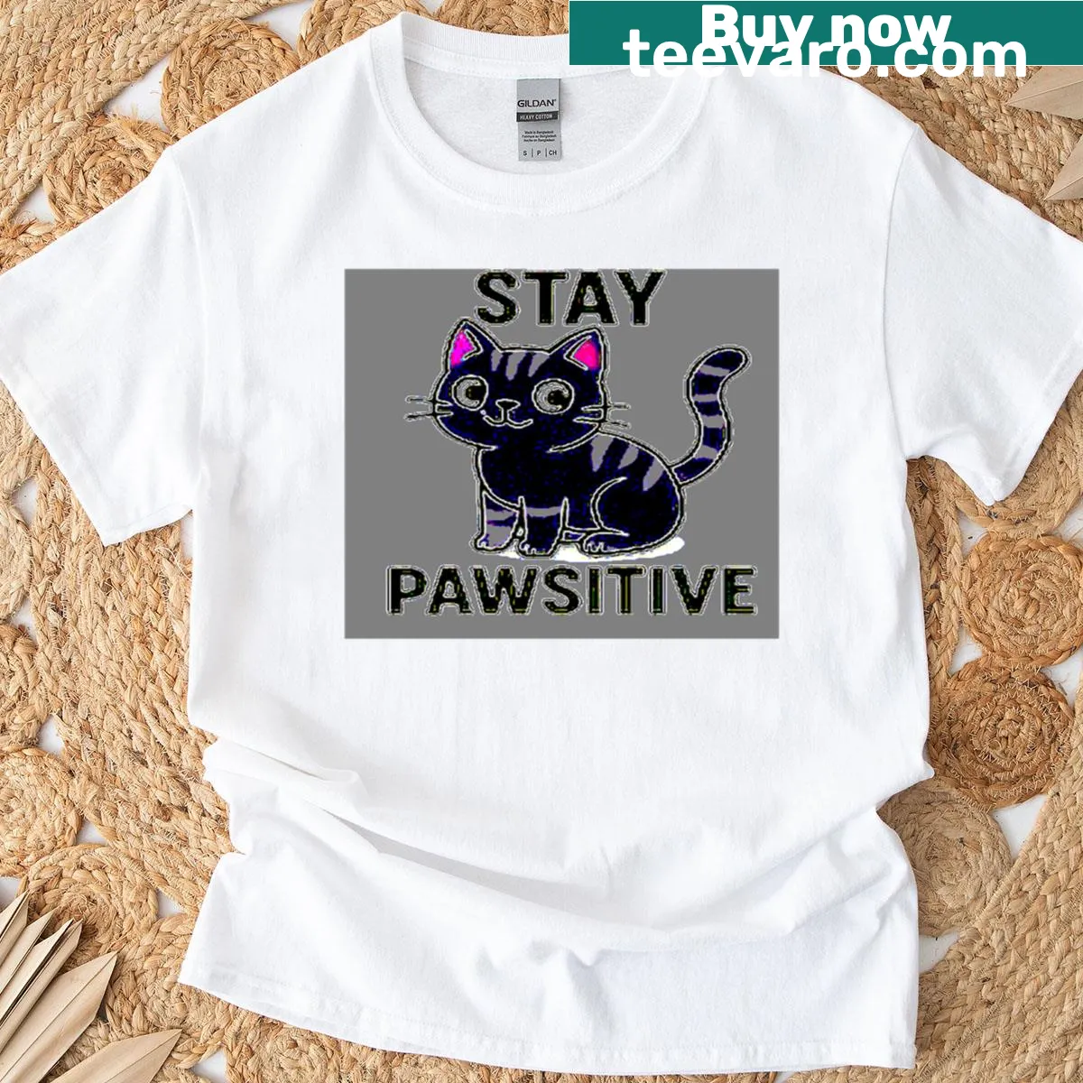 Funny cat graphic with text 'Stay Pawsitive' on T-shirt — on a men's t-shirt