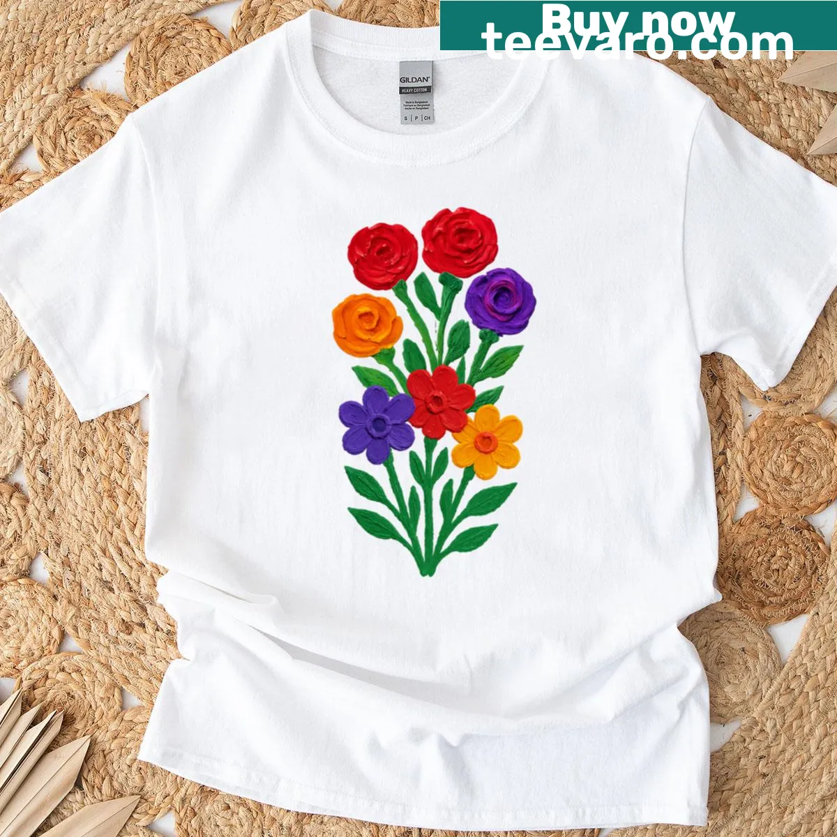 T-shirt featuring a bold finger-painted floral art design. — on a men's t-shirt