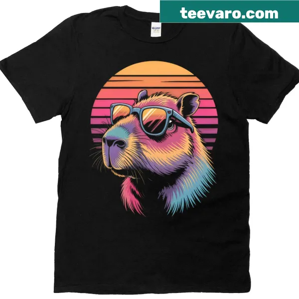 Cute T-shirt with a capybara in sunglasses and a retro 80s sunset design.