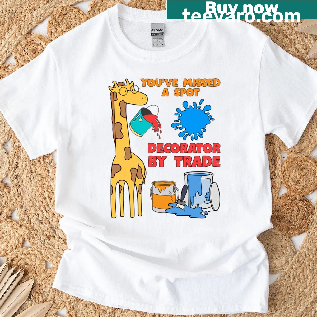 Witty text on a T-shirt that reads 'Decorator By Trade, You've Missed A Spot' — on a men's t-shirt