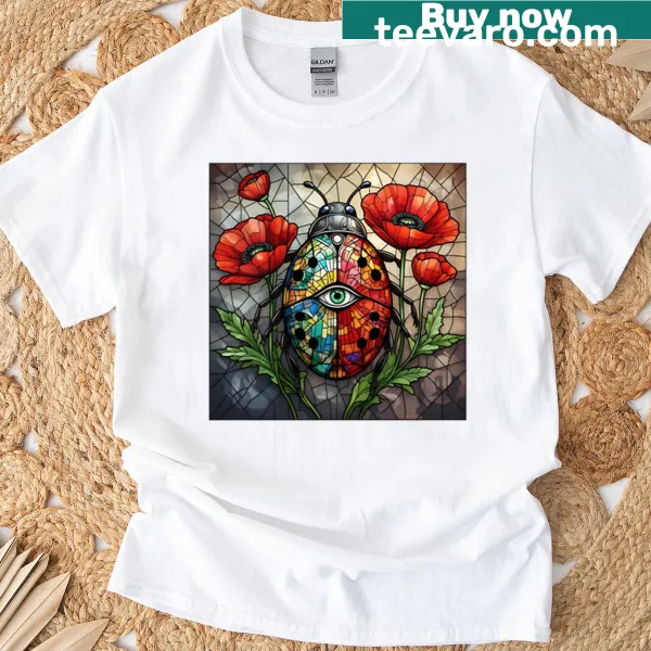 Abstract typography T-shirt featuring ladybug and poppy flower designs.