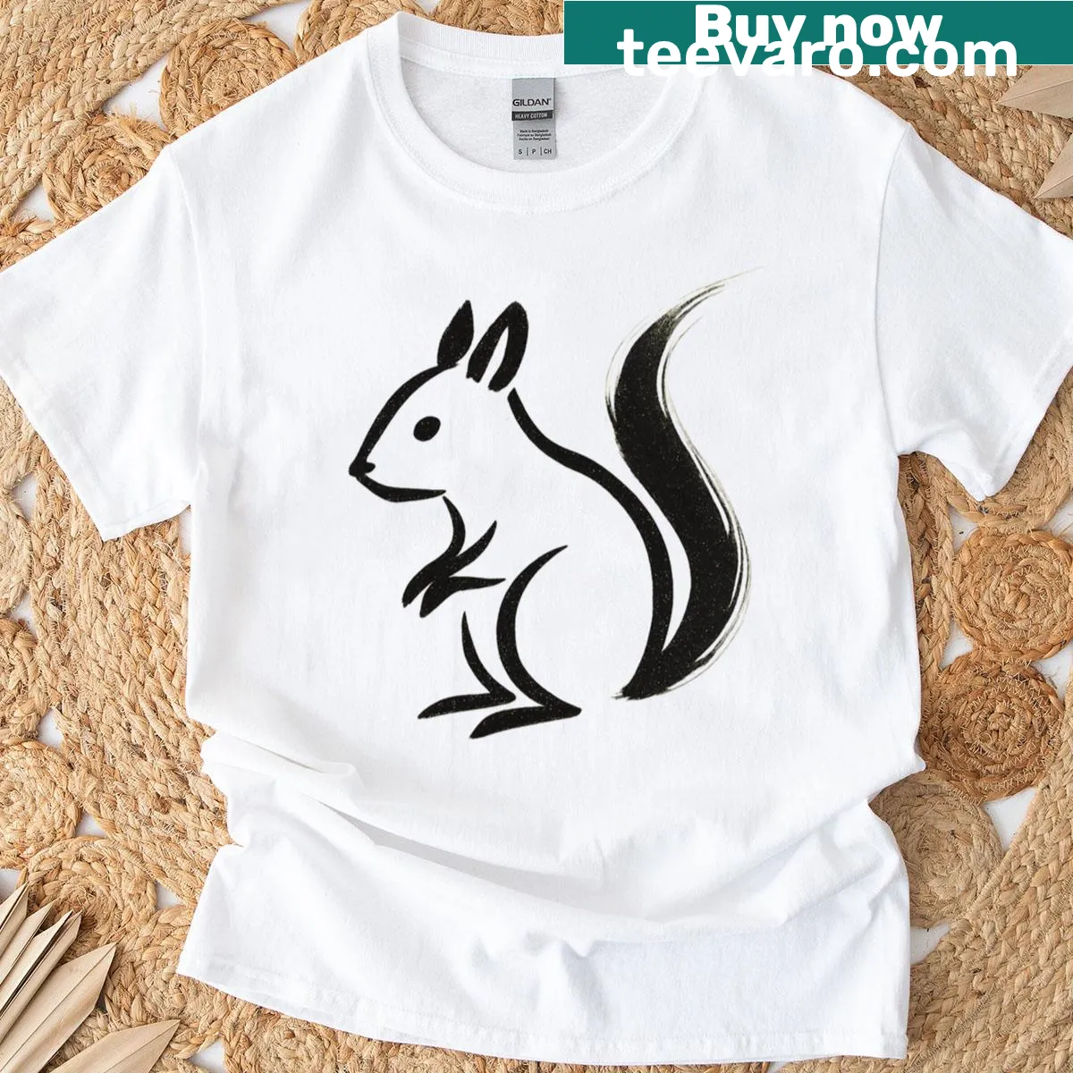 Minimalist T-shirt featuring an ink drawing of a squirrel. — on a men's t-shirt